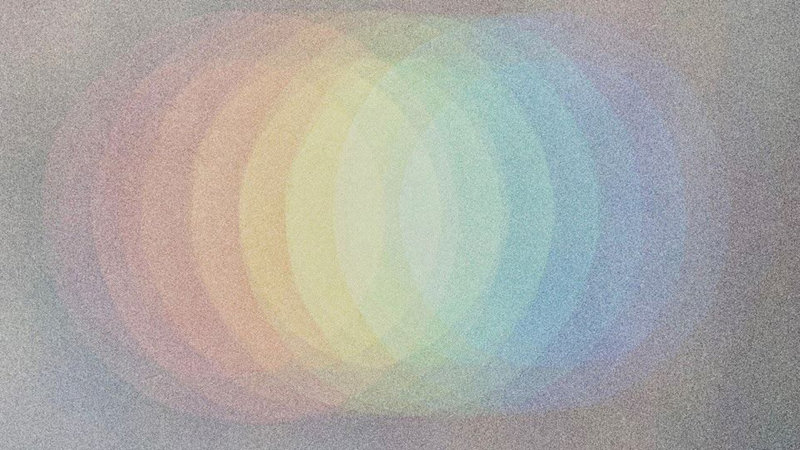 Kuvassa on harmaalla pohjalla pehmeästi pyöreitä spektrin värejä koko kuva-alalla. Kuva on osa levyn kannesta.