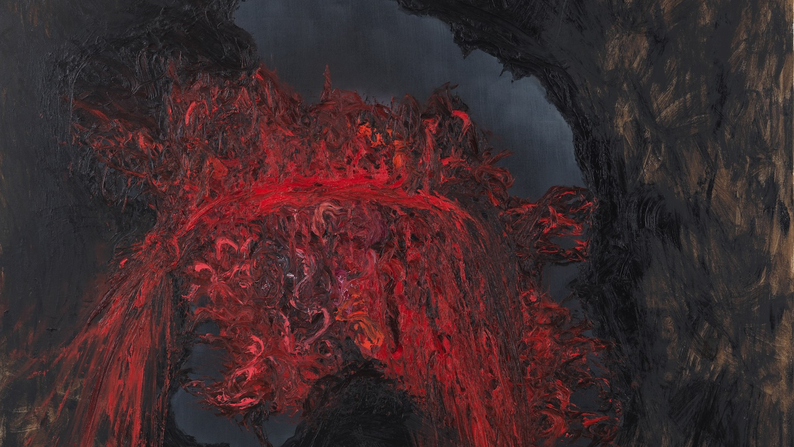 Kuvassa on maalattu liekehtiviä värejä, keltaista ja punaista sekä tummaa. Tausta on harmaa.