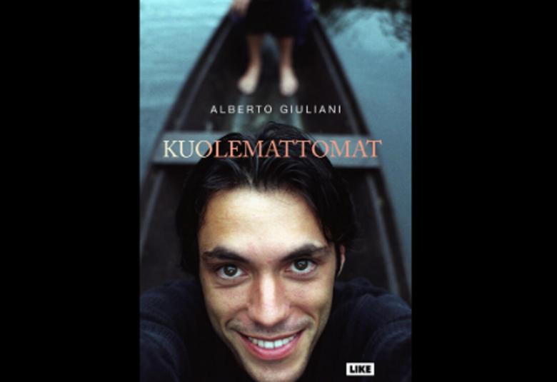 Kuvassa on Alberto Guilianin kuva kirjan kannessa keskellä. Molemmissa reunoissa on mustaa.