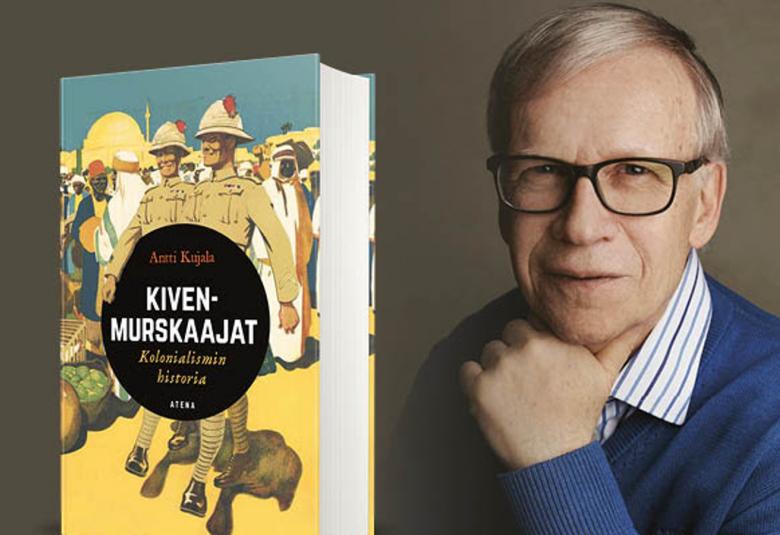 Kuvassa on Antti Kujala kädessään kirja Kivenmurskaajat - Kolonialismin historia.