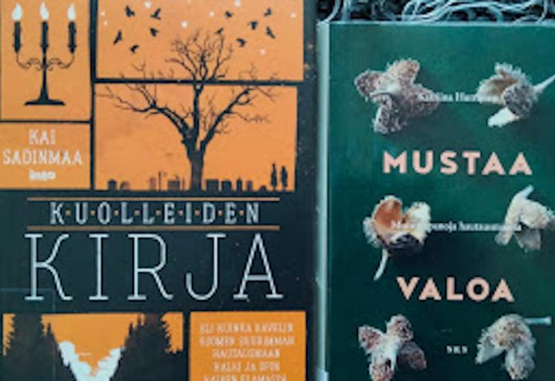 Kuvassa on kaksi kirjaa, Kuolleiden kirja ja Mustaa valoa.