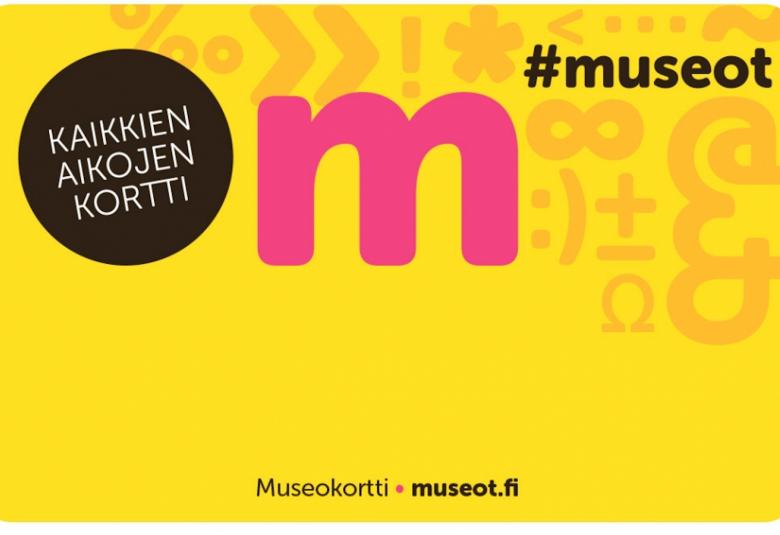 Kuvassa on museokortti, joka pohjaväriltään keltainen ja siinä on punainen isolla pieni m-kirjain. 