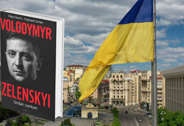 Kuvassa on Zelenskysta kertovan kirjan kansi, jossa on hänen kasvokuvansa kannessa. Oikealla on Ukrainan lippu ja taustalla kaupunkimaisemaa.