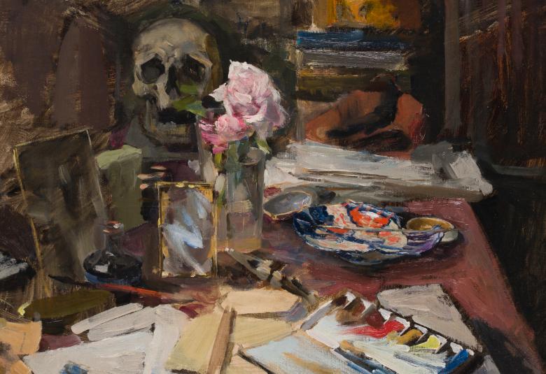 Kuvassa on maalaus Akseli Gallen-Kallelan työpöydästä, jossa on sekavasti papereita ja muita tarvikkeita. Värisävyt ovat ruskeita.