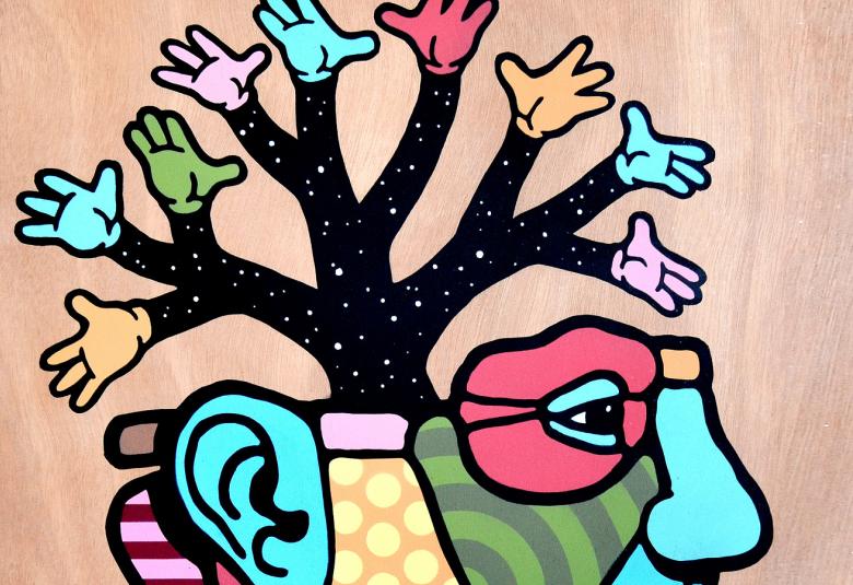 Kuvassa on piirros sivukuvasta, jossa on eri värejä kasvojen osissa ja pään kohdalla kasvaa ruskea puunrunko oksineen ja niiden päällä on turkooseja ja punaisia käsiä. Nämä muodostavat päälaen muotoisen osan koko pään kuvasta.