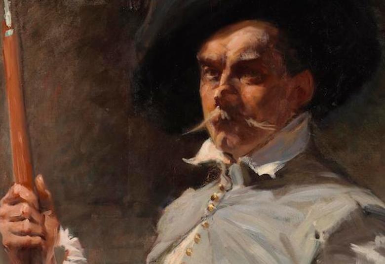 Kuvassa on Albert Edelfelt istumassa musta lierihattu päässään ja vaalean harmaa livre-takki päällään.  Hänellä on röyhelö hihansuussa ja hän pitää oikeassa kädessään ruskea keihäs.