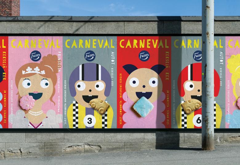  Kuvassa on rivissä värikkäitä karnevaalijulisteita, joita monta kadun varressa. 