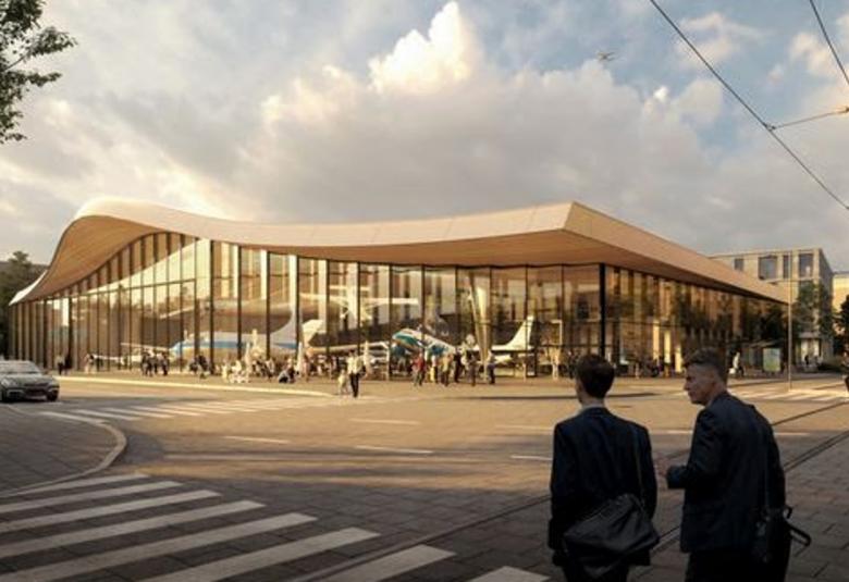 Kuvassa on Ilmailumuseon havainnekuva ja se on kaareva vaaleapuukattoinen, jonka alla on oystylasi-ikkunoita.  Edessä on risteys ja kahteen suuntaan suojatiet.