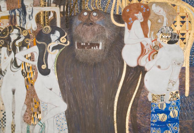 Kuvassa on ruskehtavan vaaleassa kuvassa vasemmalla kolme valkoista alastonta, ruskeatukkaista naista ja keskellä on ruskea apina. Oikealla on nainen apinan olkapäällä ja sitä katselee isovatsainen mies, jossa on siniset shortsit. 