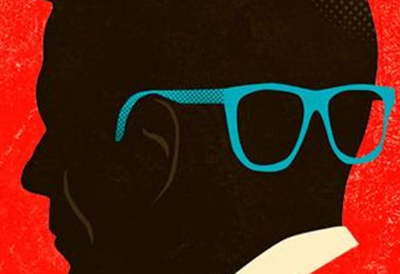 Kuvassa on kuva mustasta, isosta miehen päästä, jonka pää on käännetty sivuun ja niskassa on turkoosisankaiset lasit.  Tausta on punainen.