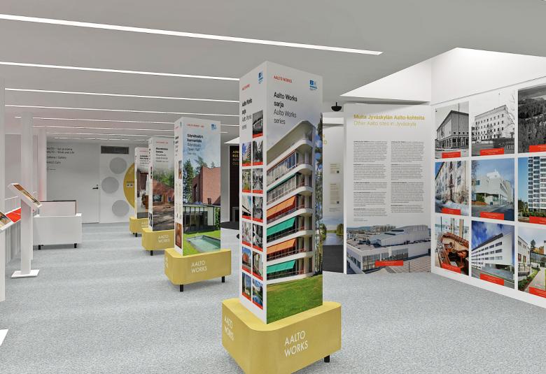 Kuvassa on vaalea tila, jossa keskellä on rivissä esitetelineitä ja oikealla roll-upeja, joissa on kuvia ja informaatiota. Vasemmalla on infonäyttöjä.