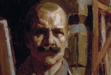 Kuvassa on Akseli Gallen-Kallelan omakuva, jossa näkyy ateljeen rakenteita. Kuva on ruskean näköinen.